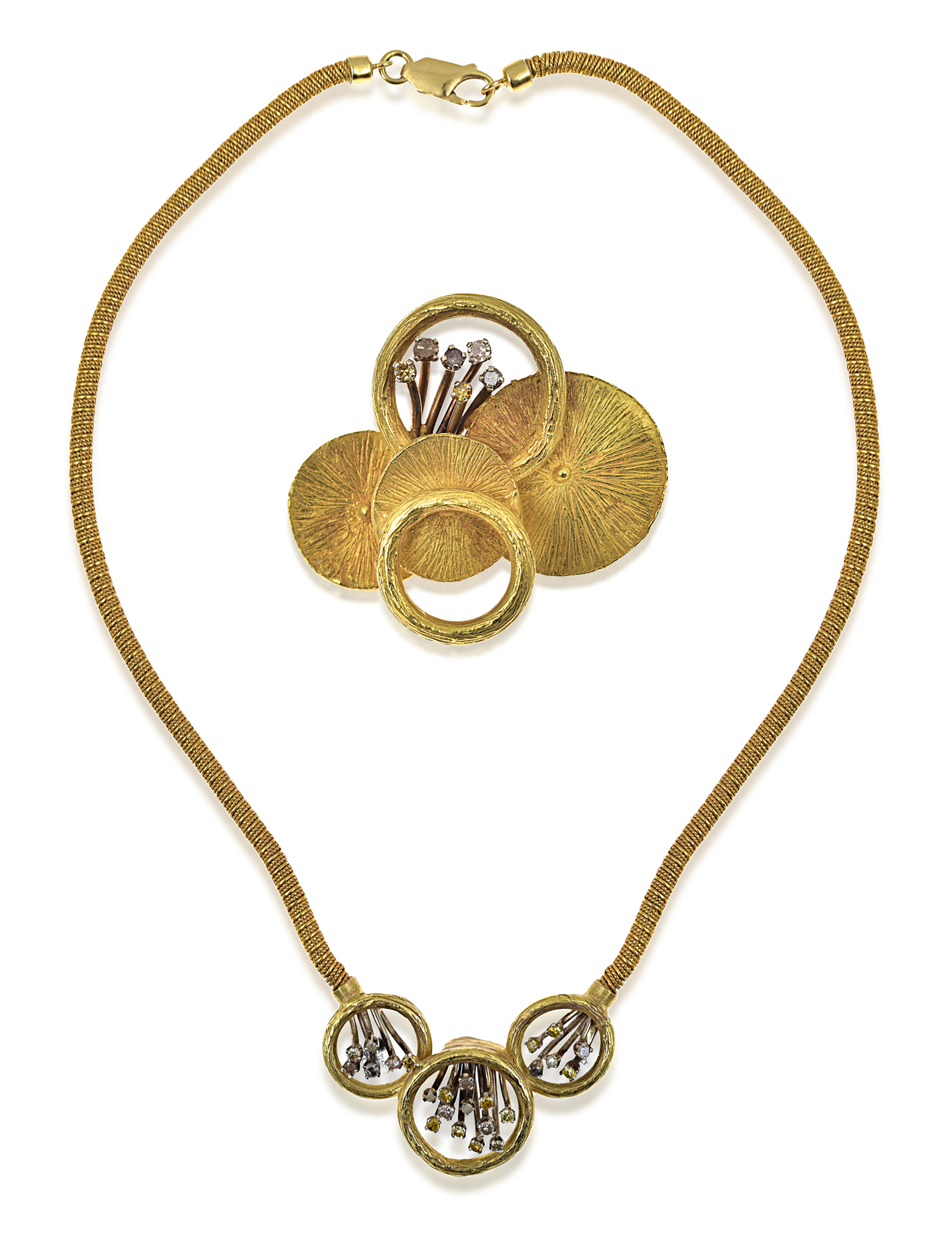 Appraisal: A GOLD AND COLOURED DIAMOND NECKLACE AND BROOCH BY JOHN