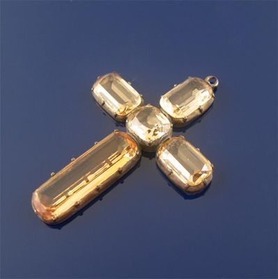 Appraisal: A th century topaz cruciform pendant the five golden topaz