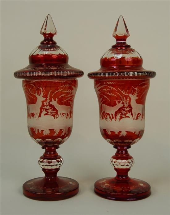 Appraisal: PAIR OF RED BOHEMIAN GLASS COVERED VASES height inches Condition