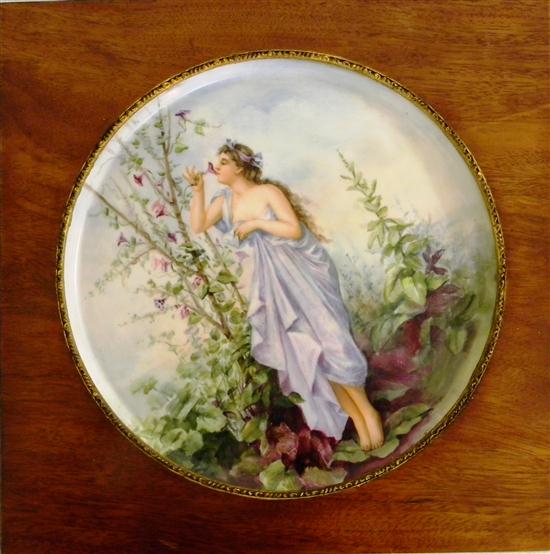 Appraisal: Porcelain round plaque depicting woman in classical drapes in garden