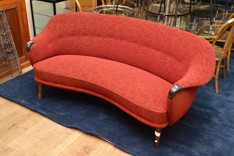 Appraisal: A DANISH RED FABRIC UPHOSLTERED TWO SEAT SOFA A DANISH