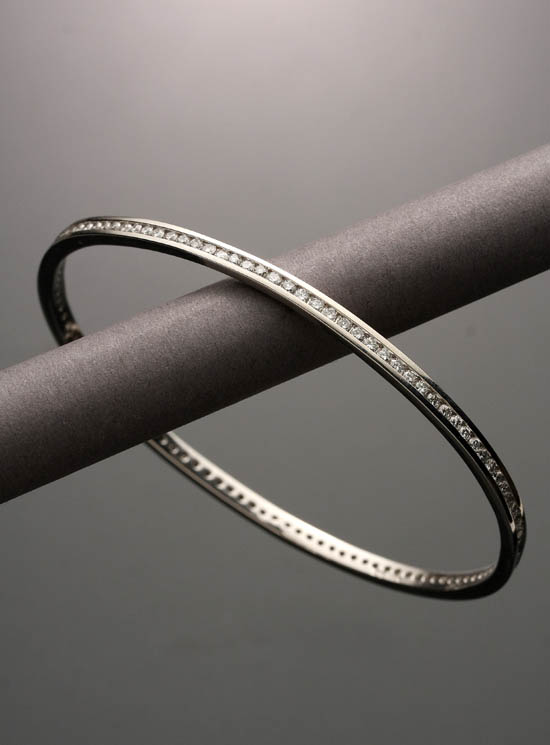 Appraisal: Lot Property of Various Owners Platinum and Diamond Bangle Bracelet