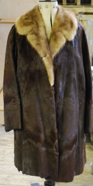 Appraisal: Lady's brown ponyskin coat with blond mink collar and label