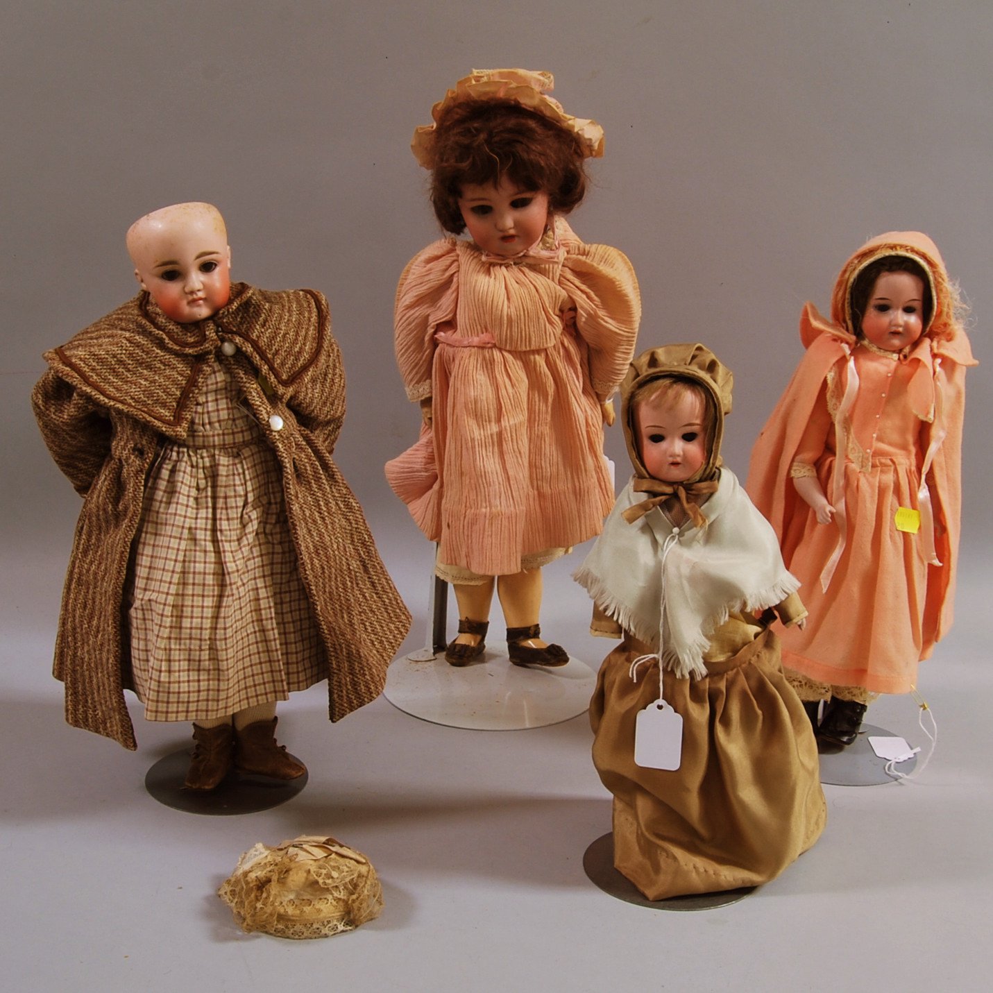 Appraisal: Four German Bisque Shoulder Head Dolls late th century an