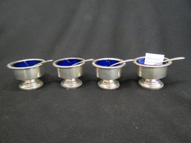 Appraisal: Sterling Silver Salt Cellars cobalt glass liners with spoons