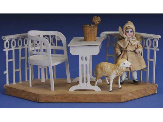 Appraisal: Miniature Porch with All Bisque Doll and Lamb Germany ca