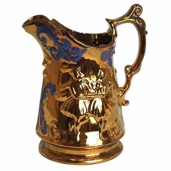 Appraisal: An English Victorian Copper Lustre Pitcher circa having a pronounced