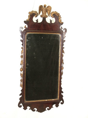 Appraisal: A George III mahogany and parcel gilt fretwork mirror circa