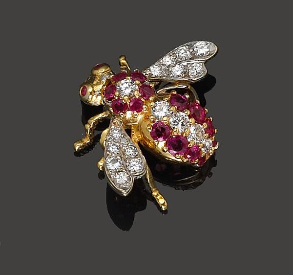 Appraisal: A diamond ruby and k bicolor gold bee brooch estimated