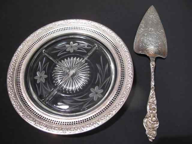 Appraisal: Sterling silver pie server with elaborate repousse handle and all