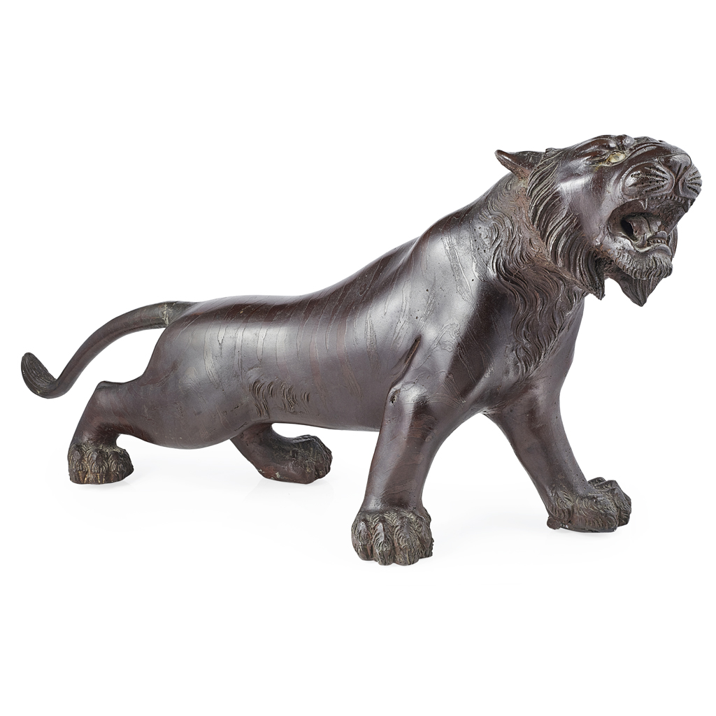 Appraisal: BRONZE MODEL OF A TIGER MEIJI PERIOD the roaring beast