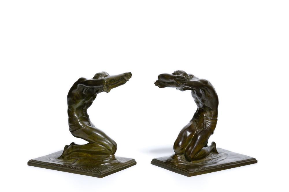 Appraisal: ISIDORE KONTI American - Kneeling Men A Pair of Bookends