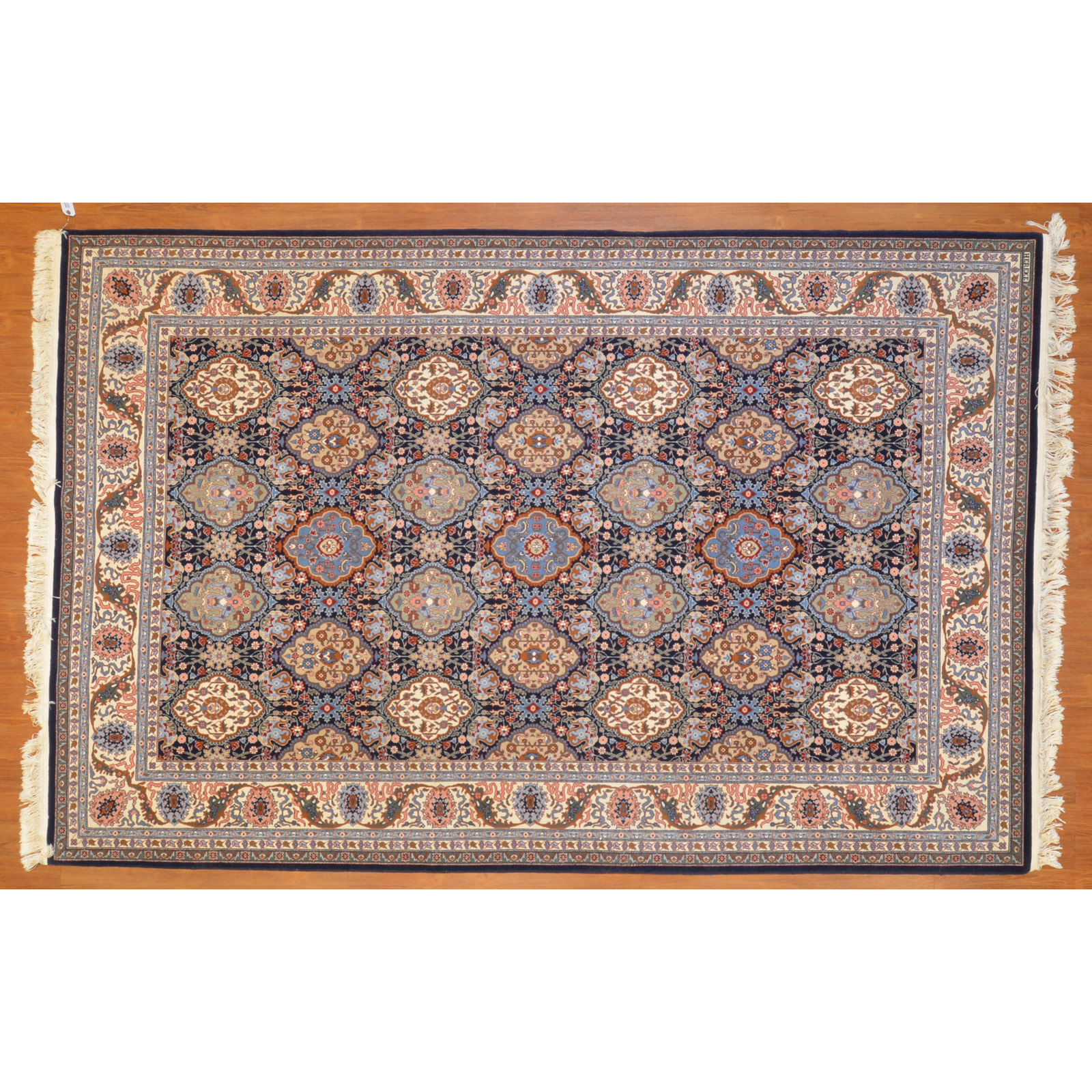 Appraisal: HEREKE RUG TURKEY X Modern hand-knotted wool pile