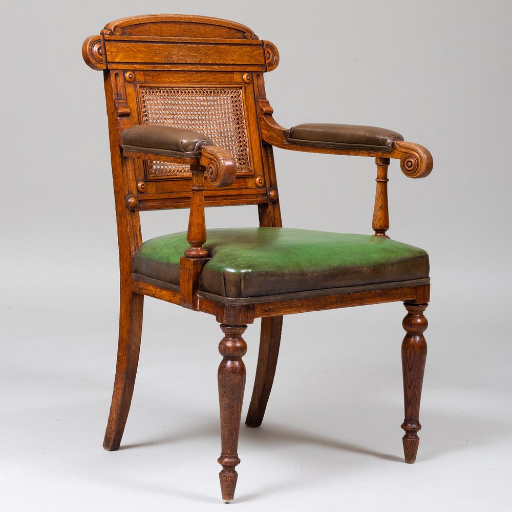 Appraisal: William IV Oak Caned and Leather Armchair Stamped C Munro