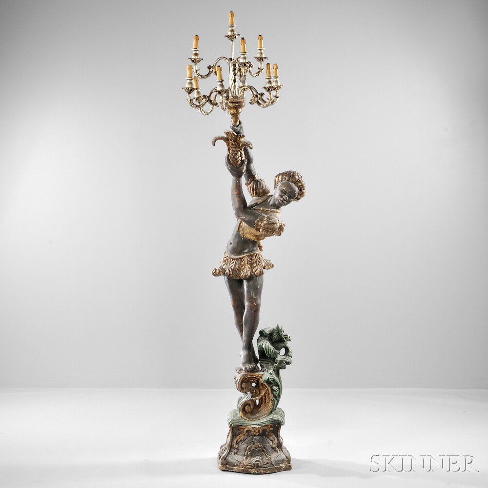 Appraisal: Carved Painted and Gilded Wood Blackamoor Figural Floor Candelabrum th