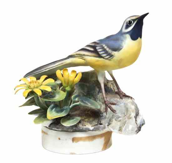 Appraisal: A Royal Worcester Dorothy Doughty Bird Grey Wagtail perched on