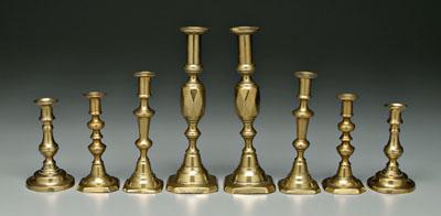 Appraisal: Four pairs brass candlesticks all push-up old mellow patina th