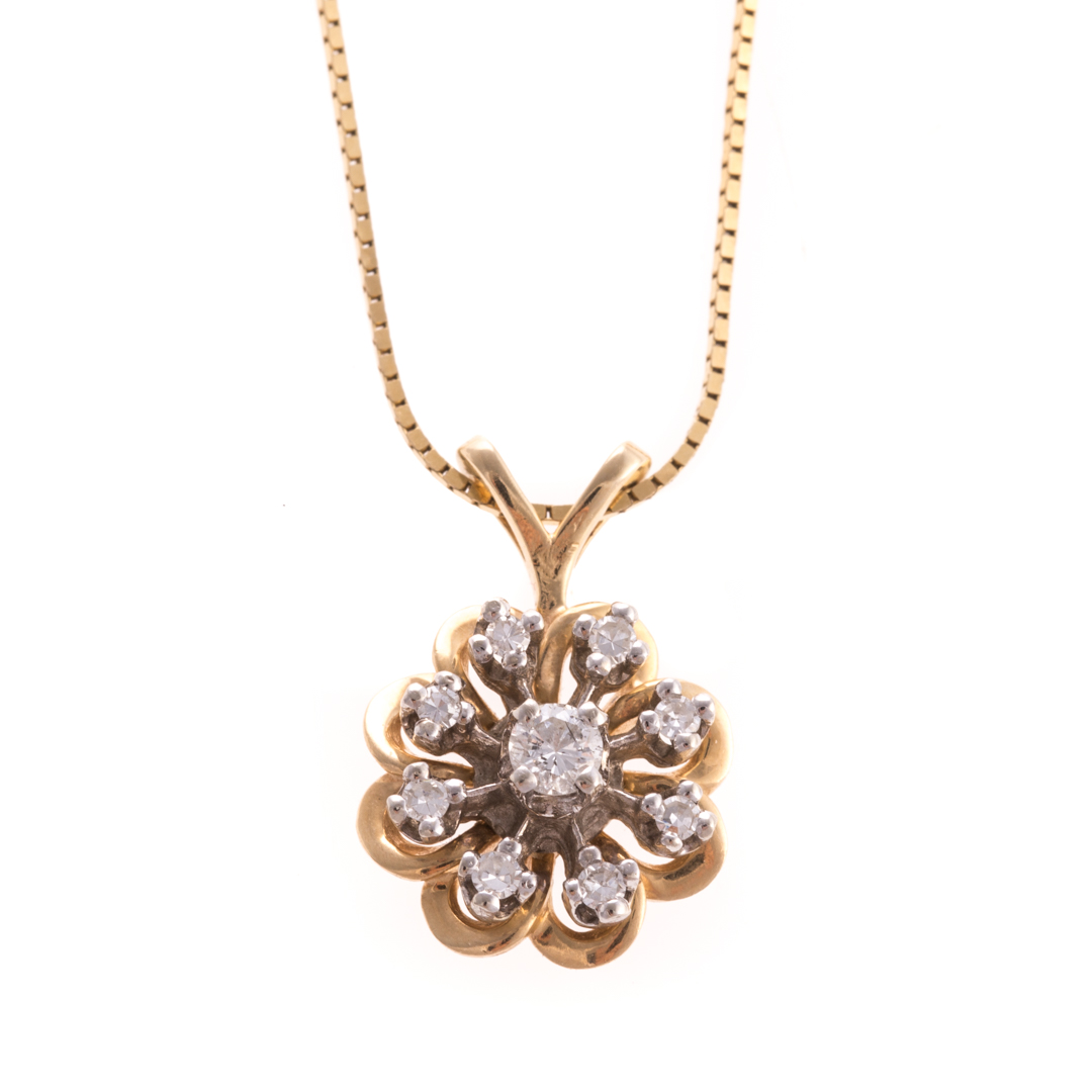 Appraisal: A Lady's Diamond Flower Pendant Necklace in K K yellow