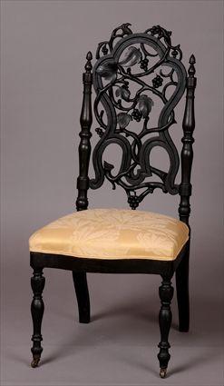 Appraisal: AMERICAN ROCOCO REVIVAL CARVED WALNUT SLIPPER CHAIR The shaped back