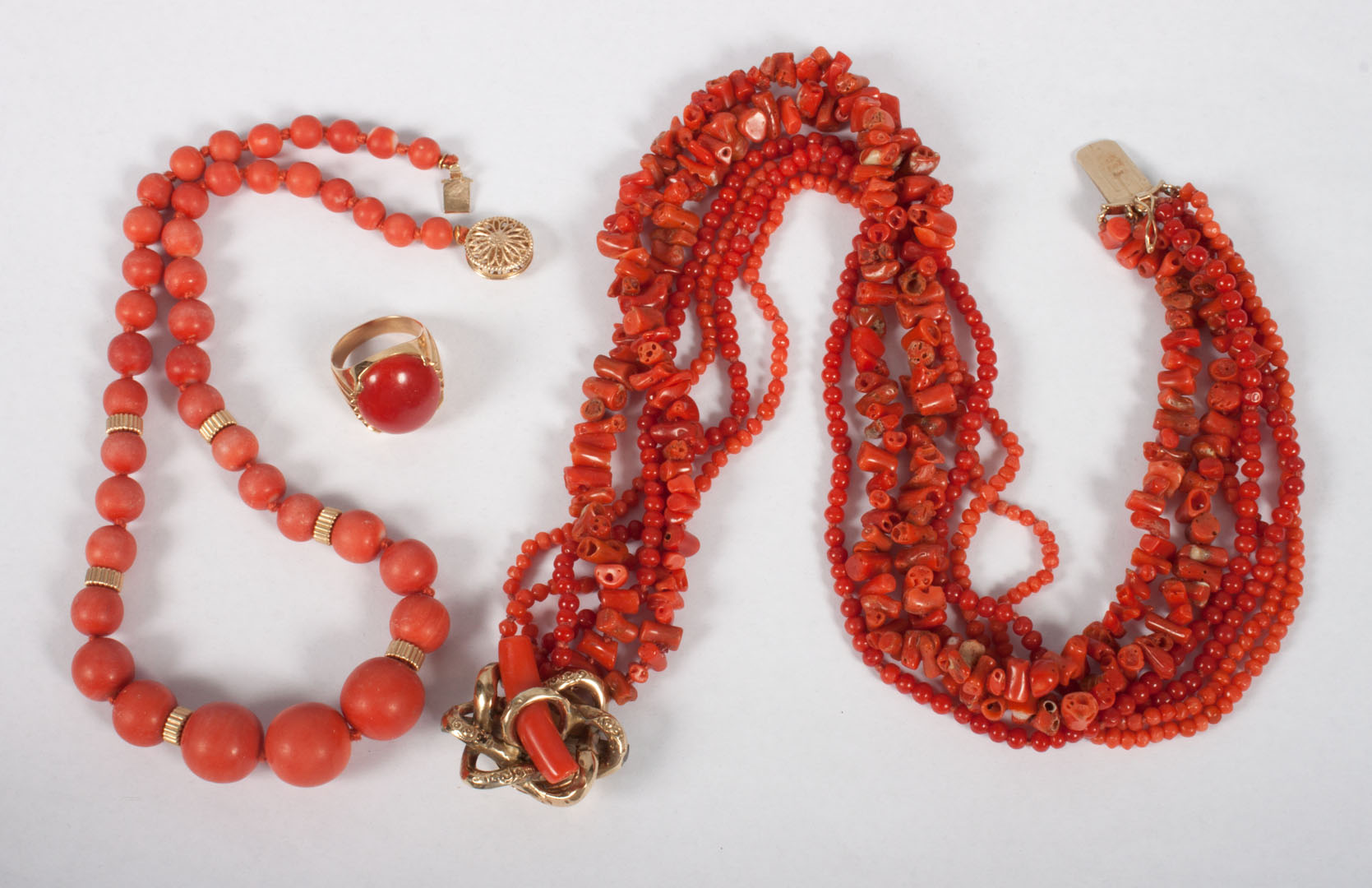 Appraisal: Group of red coral and gold jewelry including gold coral