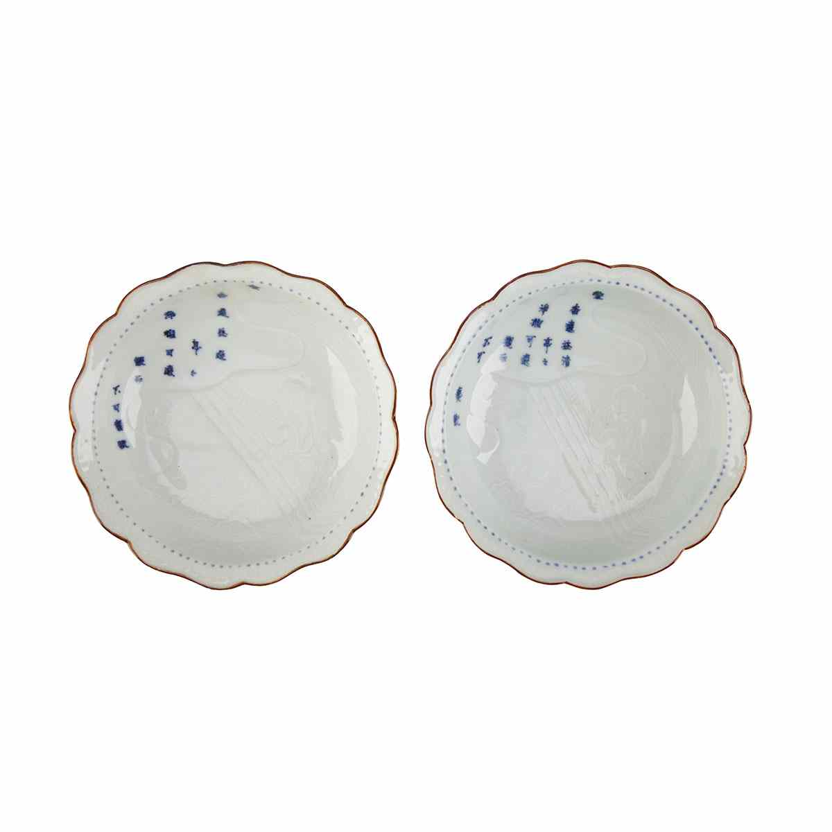 Appraisal: Pair Blue and White Dishes Japan th Century Of foliate-form