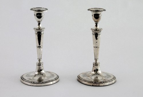 Appraisal: A pair of George III silver candlesticks John Parsons Co