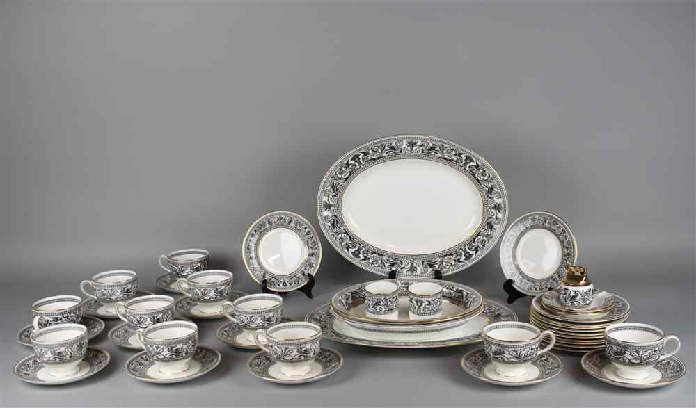 Appraisal: WEDGWOOD BLACK 'FLORENTINE' PART SERVICE including twelve bread and butter