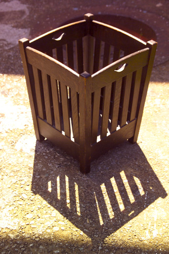 Appraisal: STICKLEY BROTHERS Wastepaper basket with flaring slatted sides and cut-out