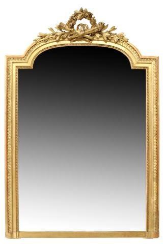 Appraisal: French Louis XVI style giltwood mirror th c arched crest