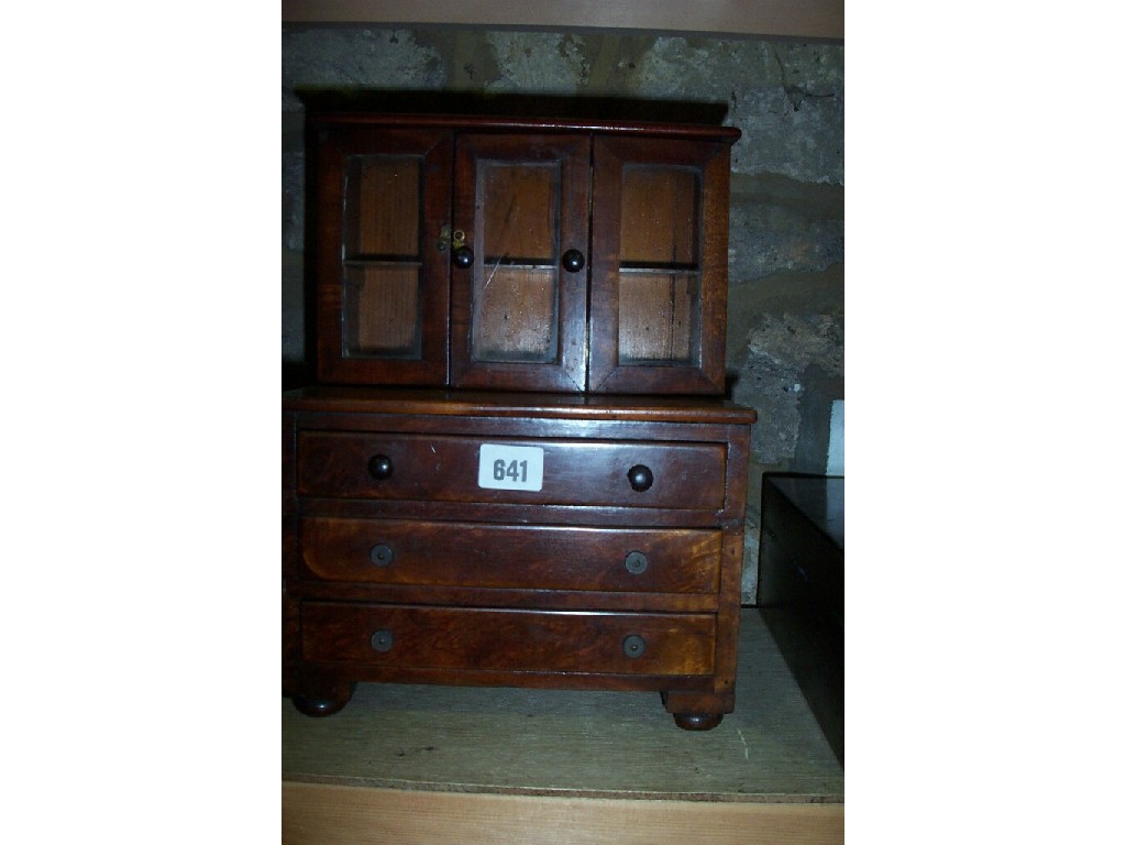 Appraisal: A late th century miniature mahogany dresser probably an apprentice