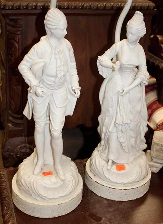 Appraisal: Pair of Rococo style bisque figures mounted as lamps Estimate