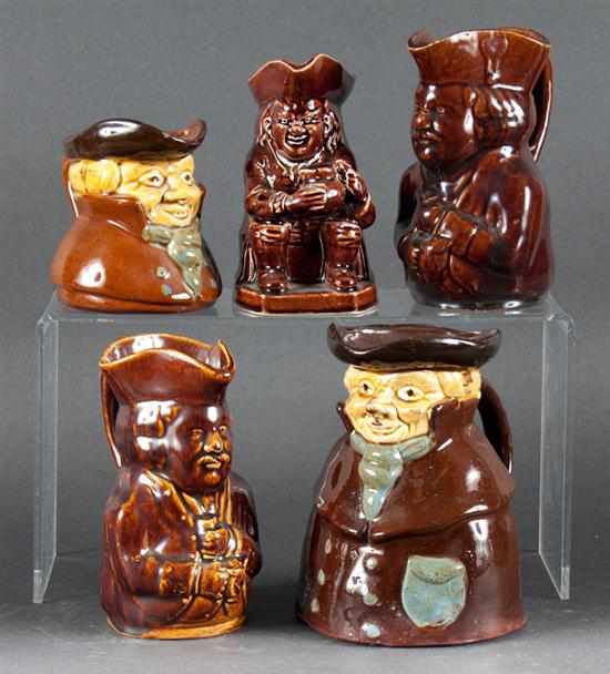 Appraisal: Five English brownware miniature toby jugs late th century three