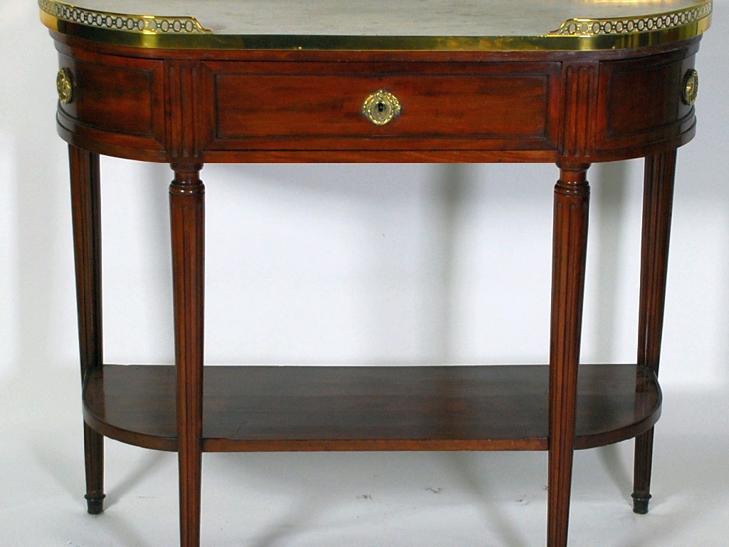 Appraisal: LOUIS XVI MAHOGANY CONSOLE DESSERTE TABLE with pierced brass gallery