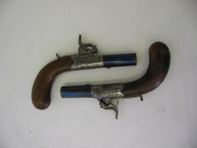 Appraisal: A PAIR OF POCKET PISTOLS c with blued screw off