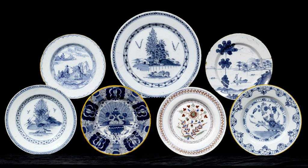 Appraisal: AN ENGLISH DELFTWARE PLATE FIVE OTHER ENGLISH AND DUTCH DELFTWARE