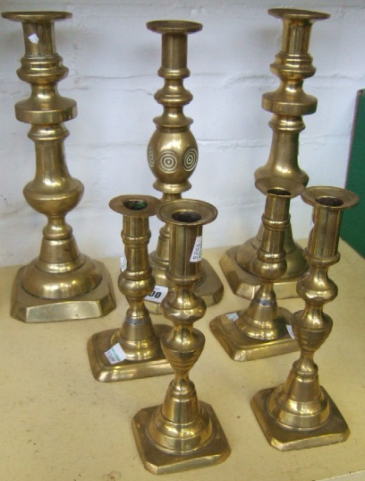 Appraisal: Three pairs of English brass candelsticks th century tallest cm