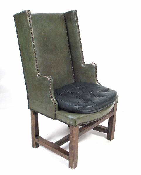 Appraisal: A Louis XVI style stained hardwood and green leather upholstered