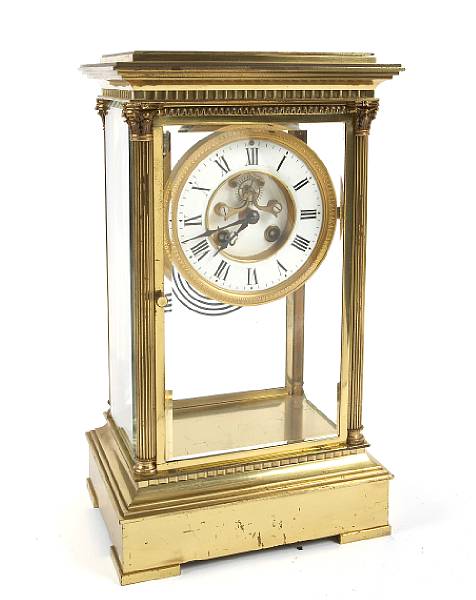 Appraisal: A French gilt brass and four glass mantel clock height