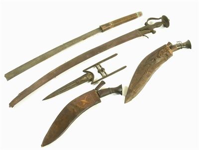 Appraisal: Two kukris with leather scabbards one with a shield of