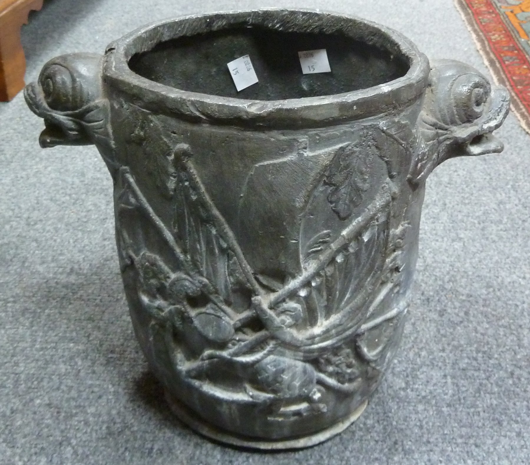 Appraisal: A lead jardiniere with raised decoration of Nelson to one