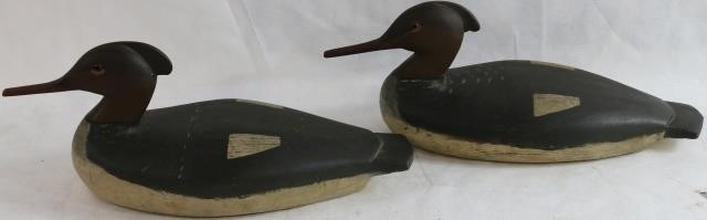 Appraisal: PAIR OF MERGANSER HEN DECOYS CA PRIMITIVETAIL CARVING BILL HAS