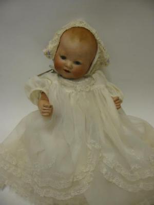 Appraisal: An Armand Marseille bisque head baby doll with blue sleeping