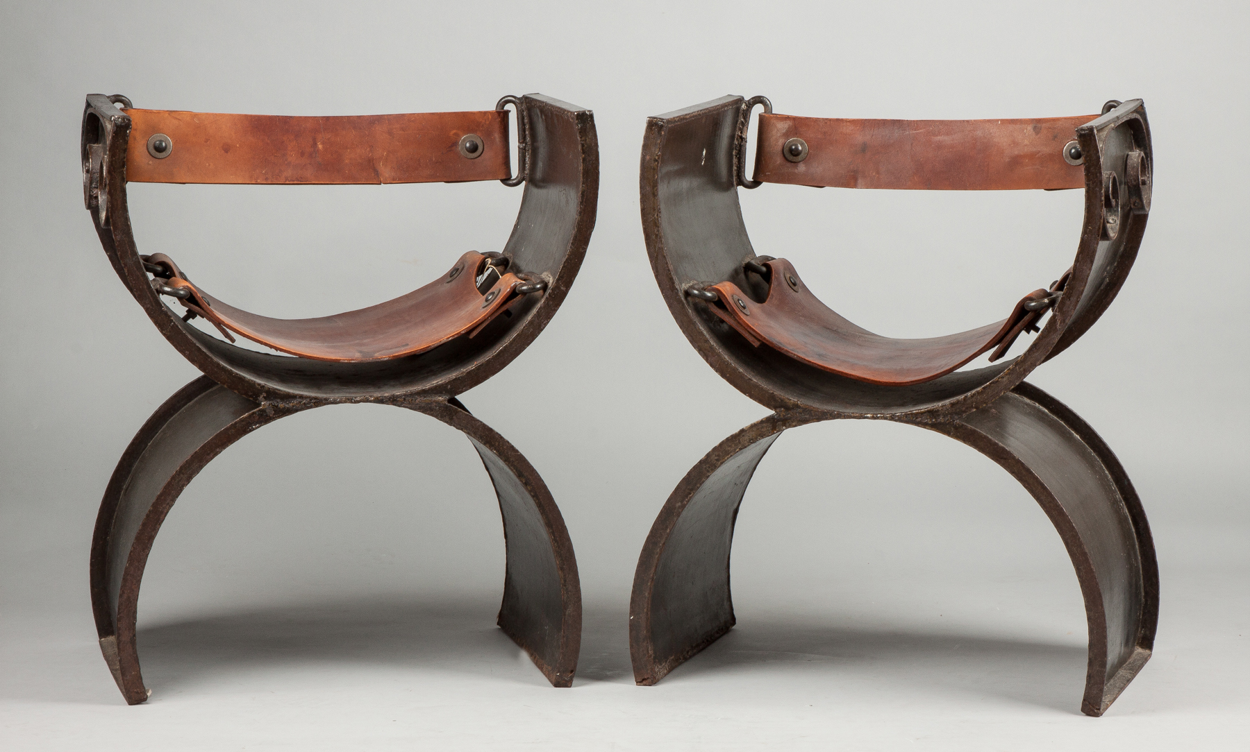 Appraisal: Victor Delfin Peruvian b Welded Steel Leather Chairs Similar Delfin