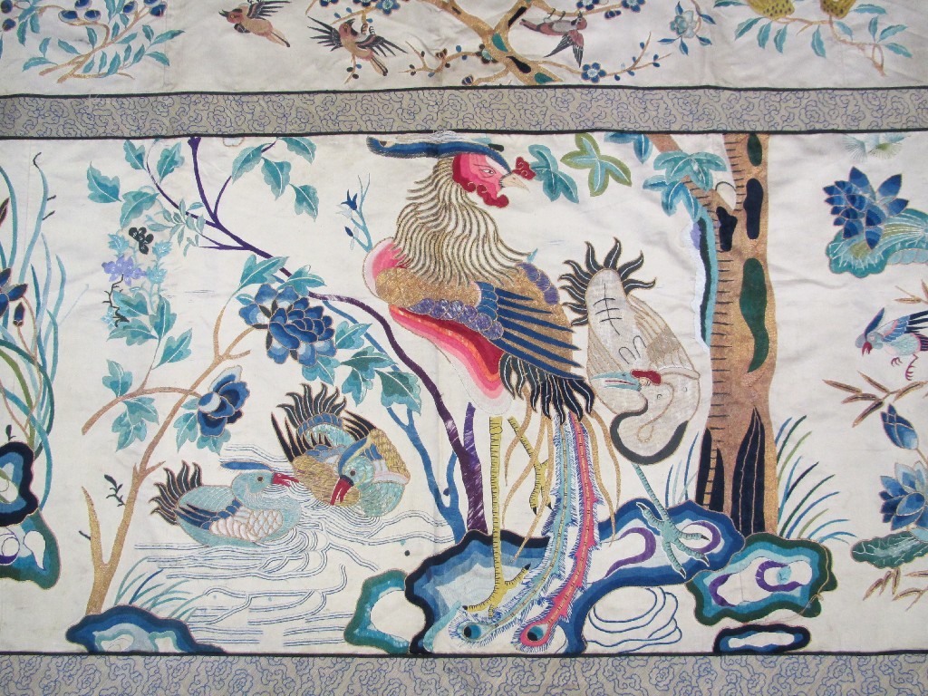 Appraisal: A Chinese silk panel embroidered with metal threads depicting exotic