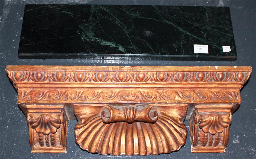 Appraisal: CARVED GILT HANGING WALL SHELF WITH MARBLE TOP having a