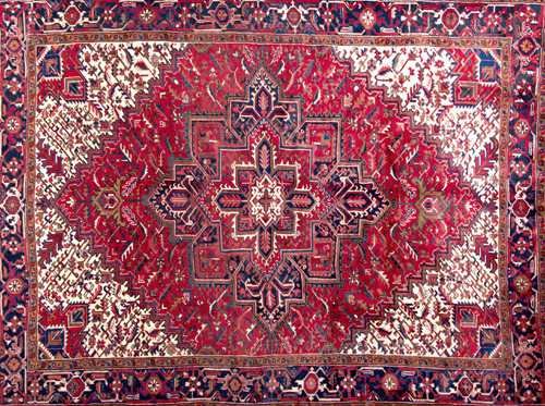 Appraisal: PERSIAN HERIZ Carpet with elaborate snowflake medallion on a stylized