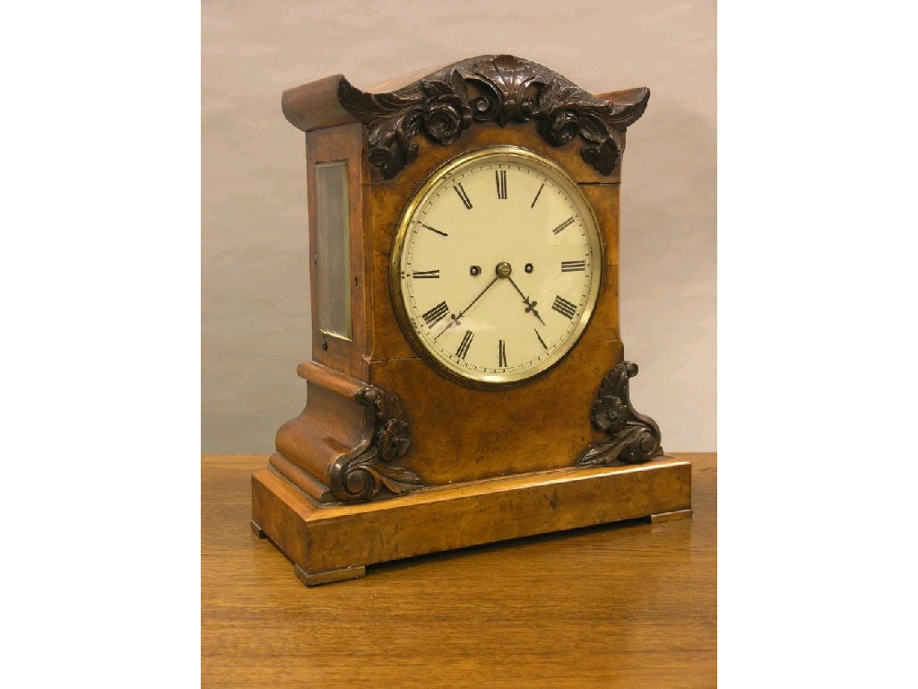 Appraisal: A Victorian burr walnut eight-day bracket clock featuring enamelled dial