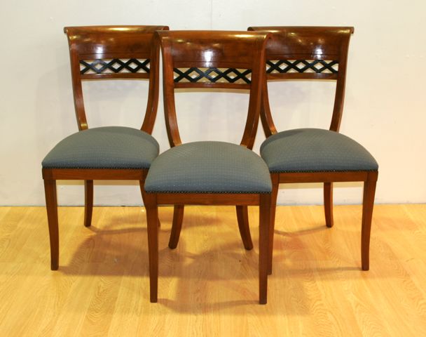 Appraisal: A set of eight fruitwood ebonised and upholstered dining chairs