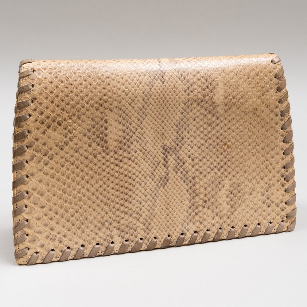 Appraisal: Yves Saint Laurent Textured Leather Clutch Gilt embossed label x