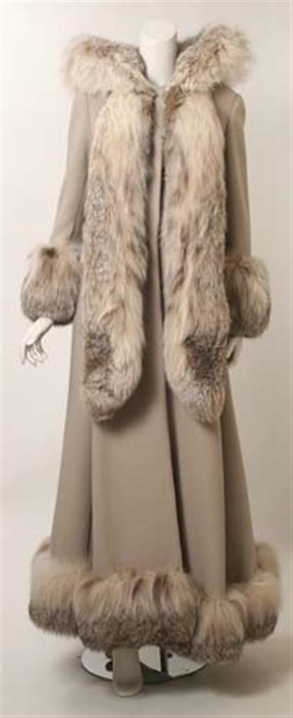 Appraisal: Dramatic pale taupe wool fox-trimmed swing coat s Ash blonde